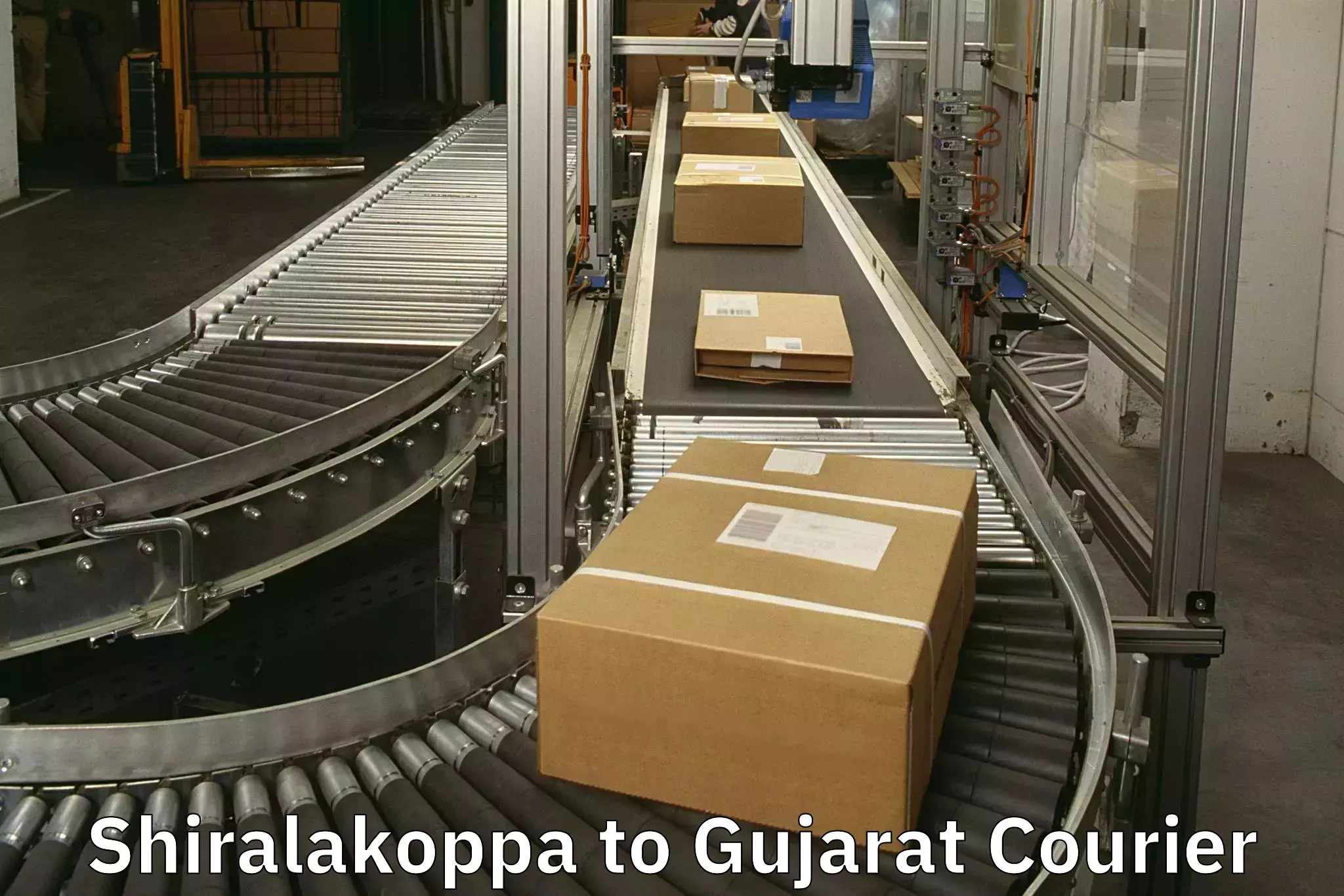 Baggage courier pricing Shiralakoppa to Bhuj