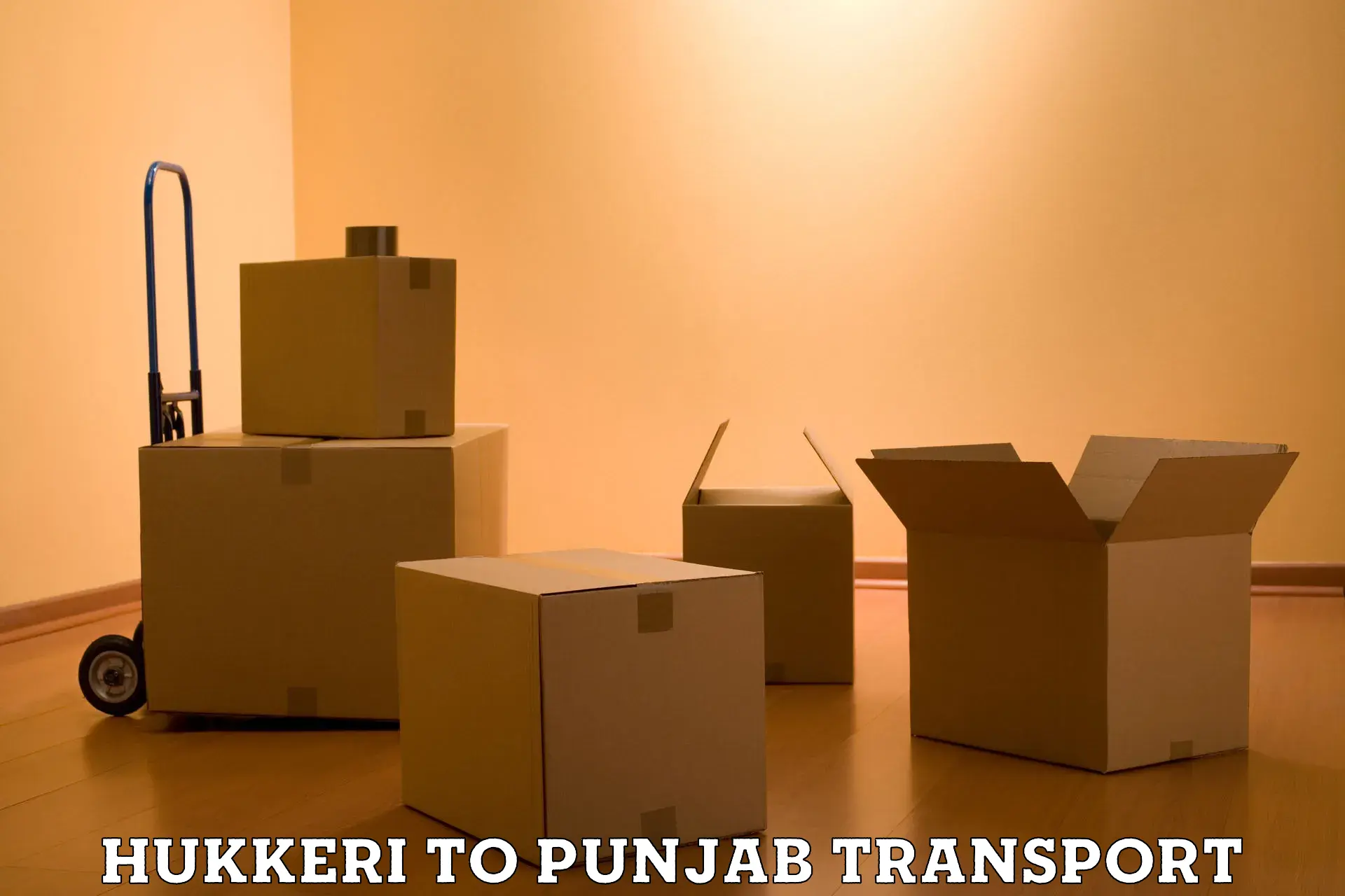 Two wheeler parcel service Hukkeri to Punjab